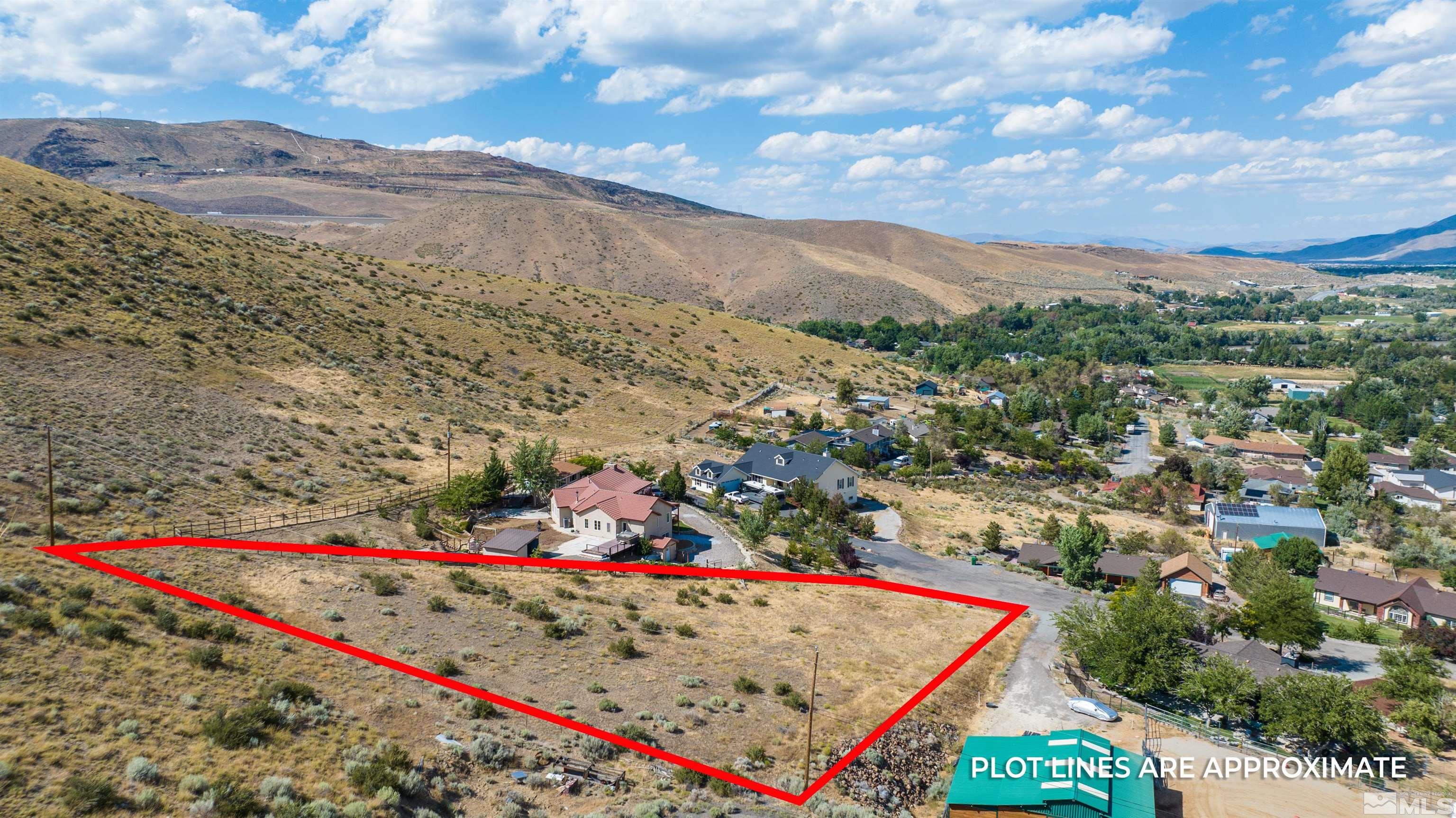 110 Del Mesa Circle Reno, NV 89521 - Photo 23 of 33 a view of a book with a small yard