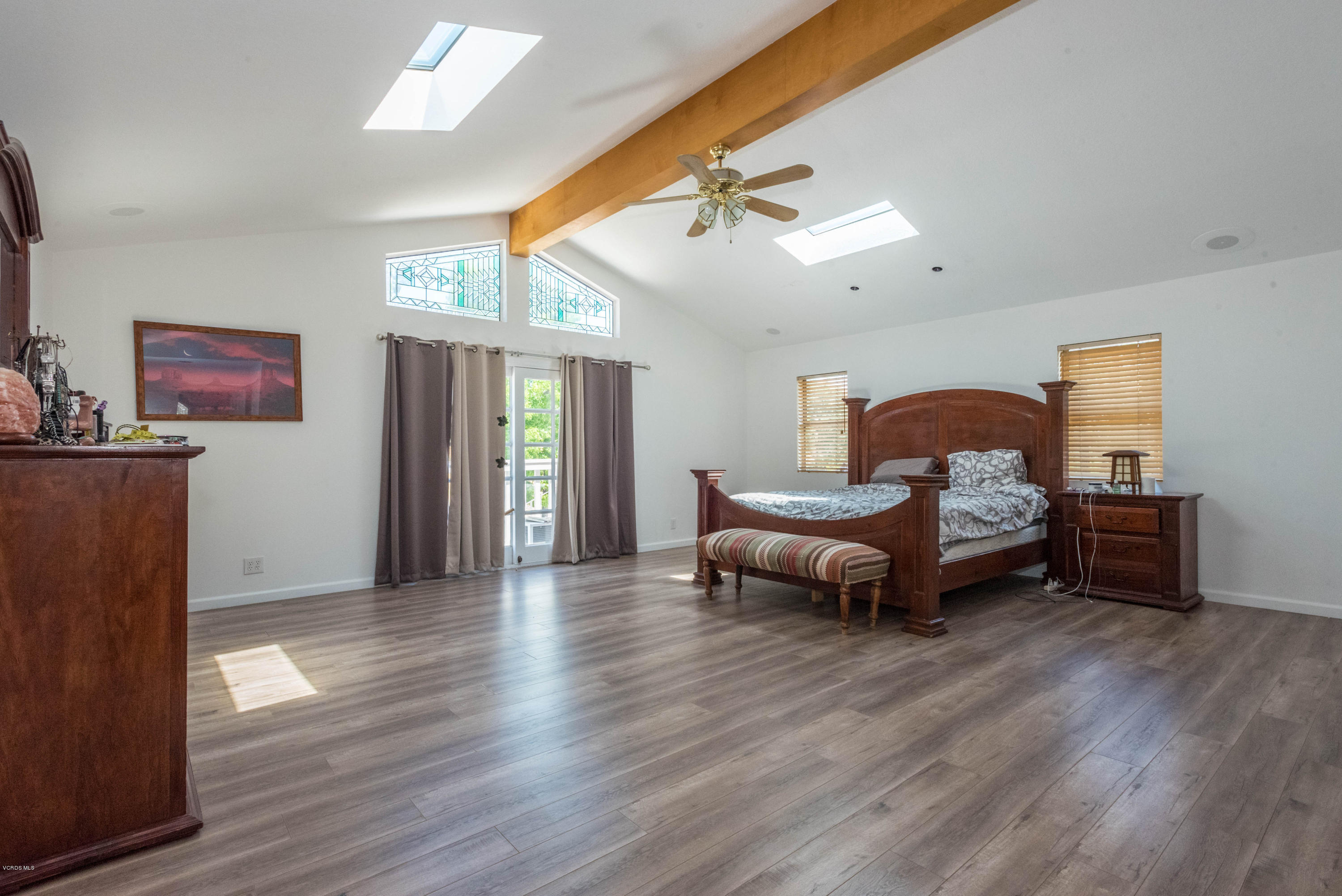 26026 Redbluff Drive Calabasas, CA 91302 - Photo 15 of 23 a living room with furniture and a wooden floor