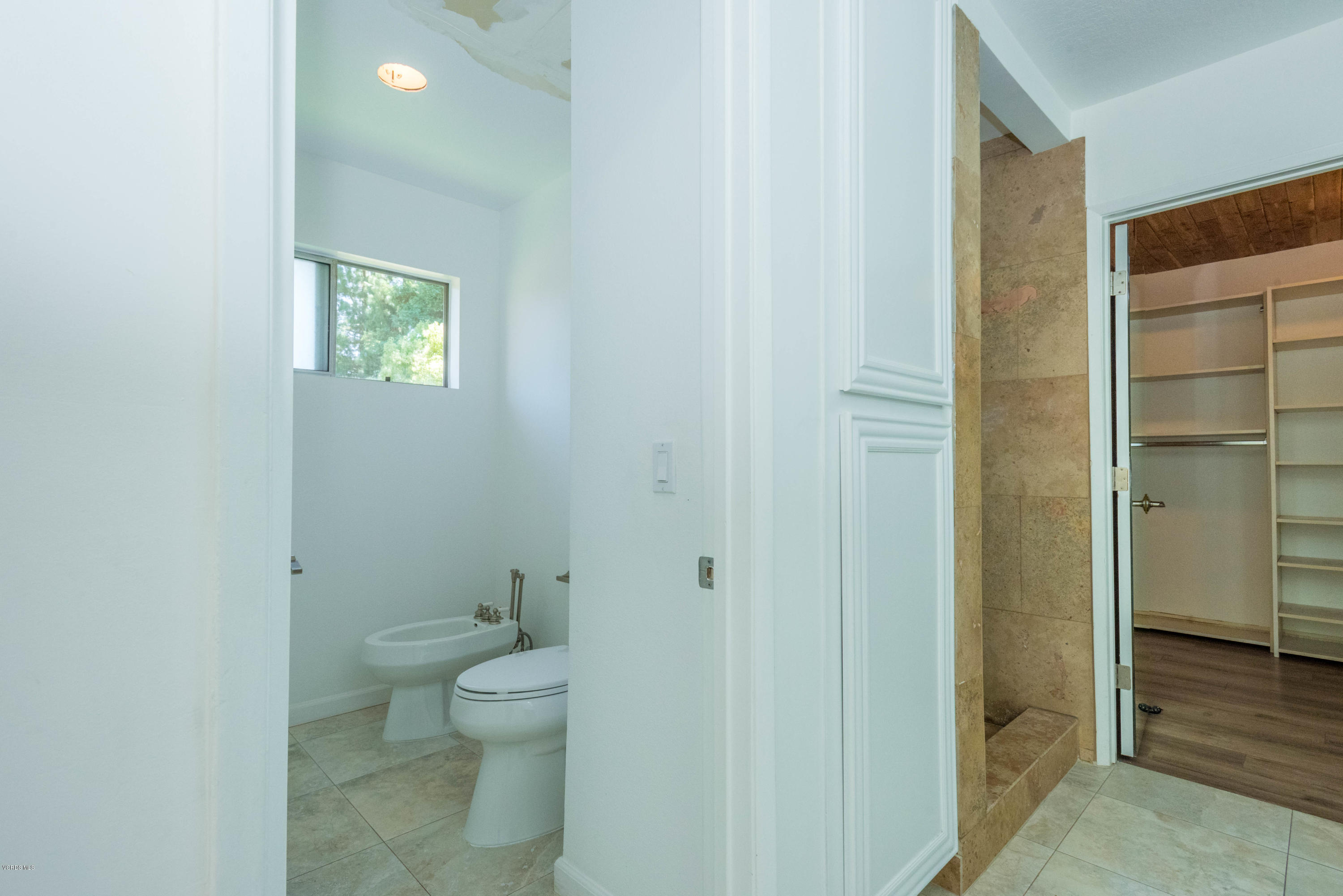 26026 Redbluff Drive Calabasas, CA 91302 - Photo 17 of 23 a bathroom with a toilet and a shower