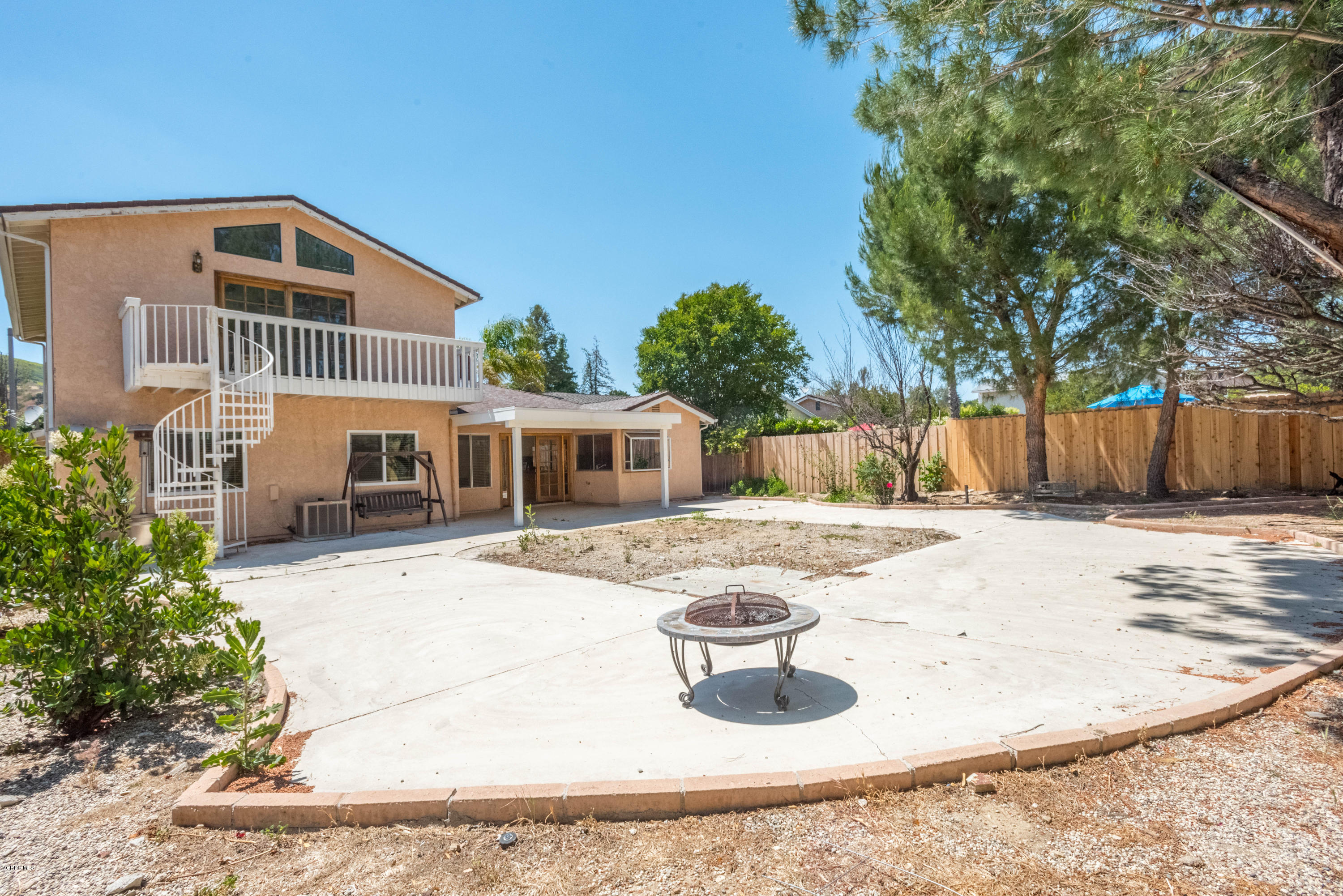 26026 Redbluff Drive Calabasas, CA 91302 - Photo 21 of 23 a front view of house with yard and trees in the background