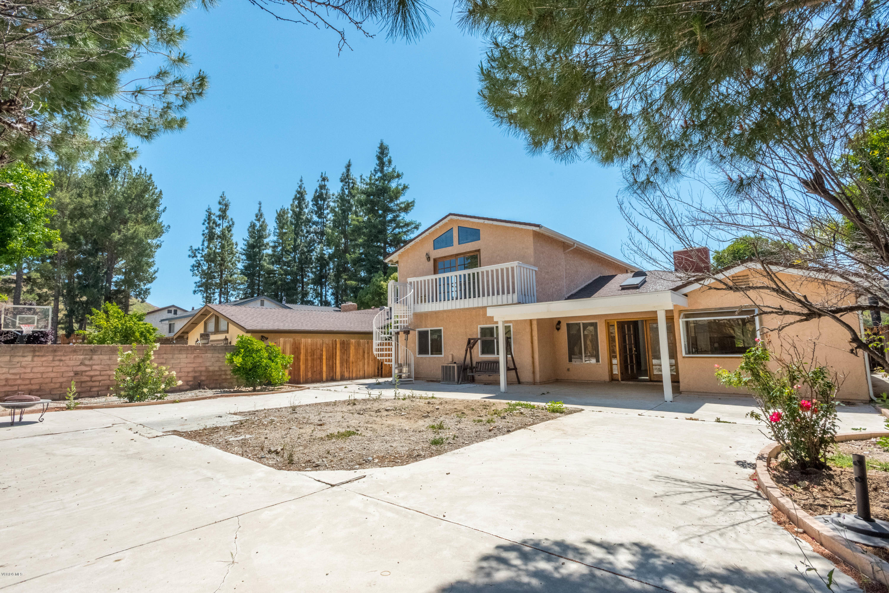 26026 Redbluff Drive Calabasas, CA 91302 - Photo 23 of 23 a view of a white house with a yard