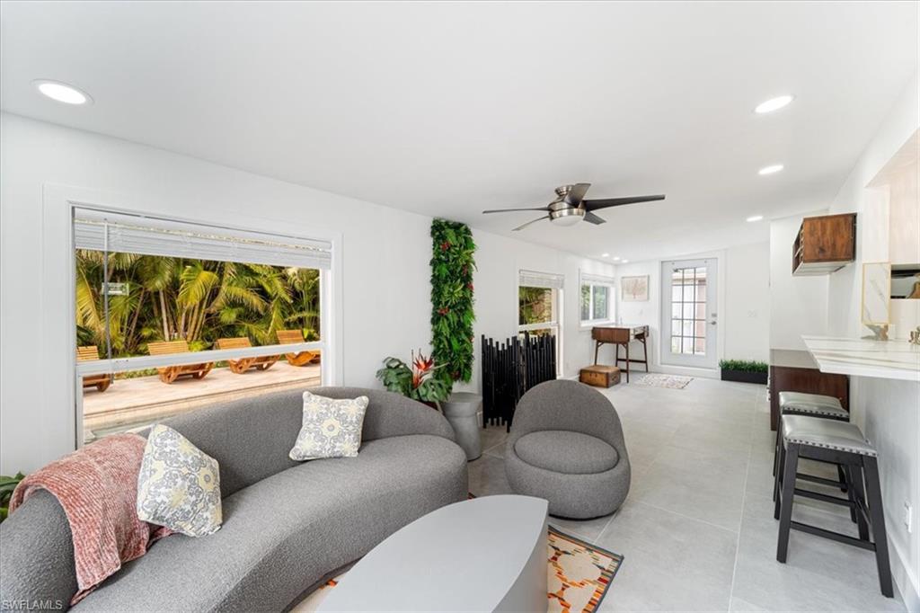 2123 Holiday Lane Naples, FL 34104 - Photo 17 of 32 Living room with ceiling fan