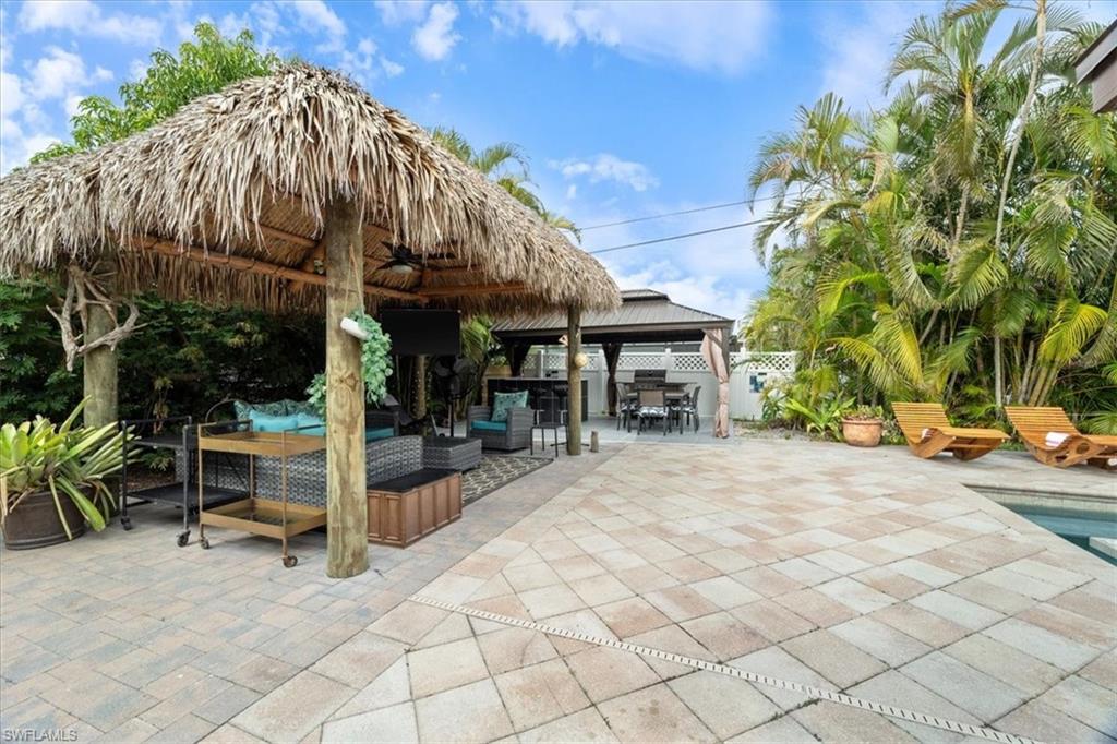 2123 Holiday Lane Naples, FL 34104 - Photo 23 of 32 View of patio with a gazebo and an outdoor living space