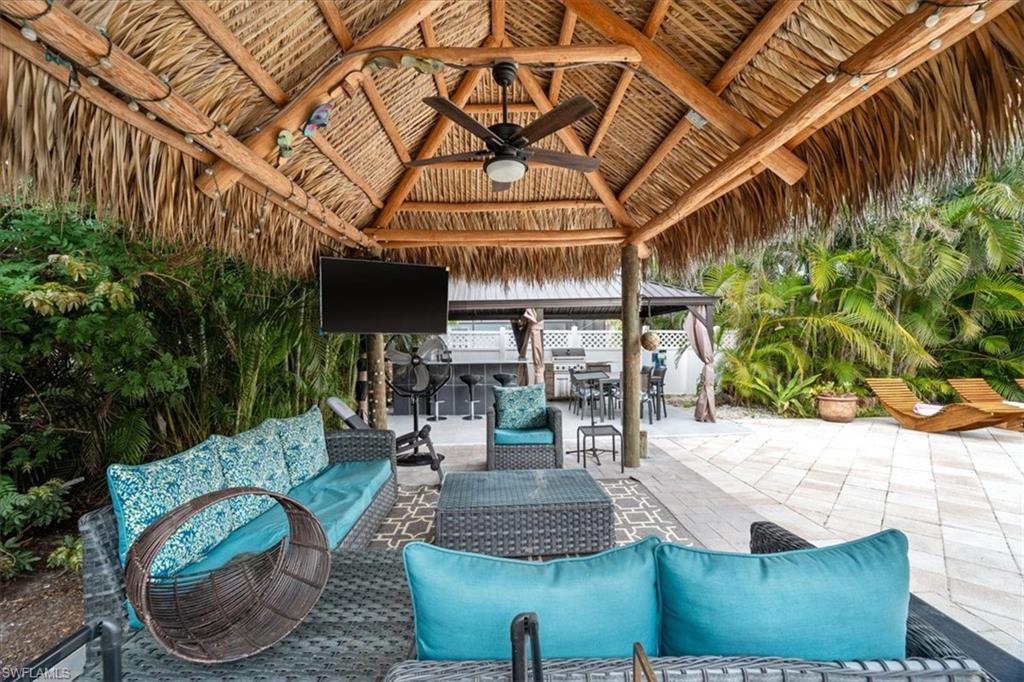 2123 Holiday Lane Naples, FL 34104 - Photo 24 of 32 View of patio / terrace featuring outdoor lounge area, a gazebo, and ceiling fan