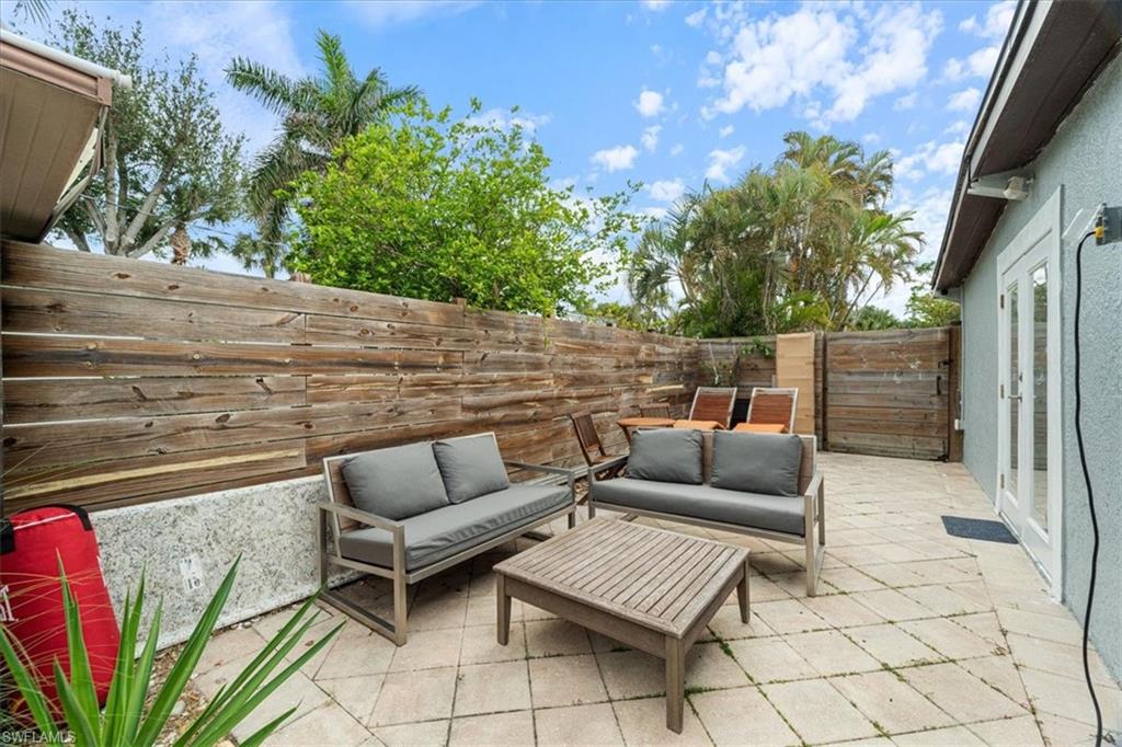 2123 Holiday Lane Naples, FL 34104 - Photo 30 of 32 View of patio / terrace with an outdoor hangout area