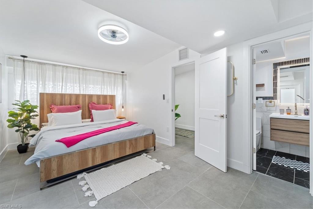 2123 Holiday Lane Naples, FL 34104 - Photo 8 of 32 Bedroom featuring ensuite bathroom