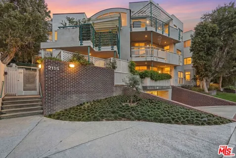 a view of a pathway with a tree