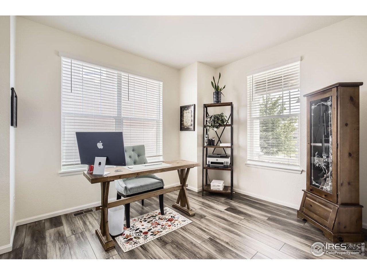 12889 Clearview Street Firestone, CO 80504 - Photo 11 of 38 a workspace with furniture and a window