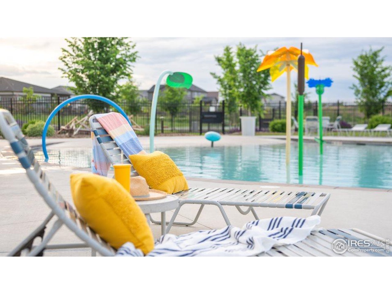 12889 Clearview Street Firestone, CO 80504 - Photo 29 of 38 a view of swimming pool with outdoor seating