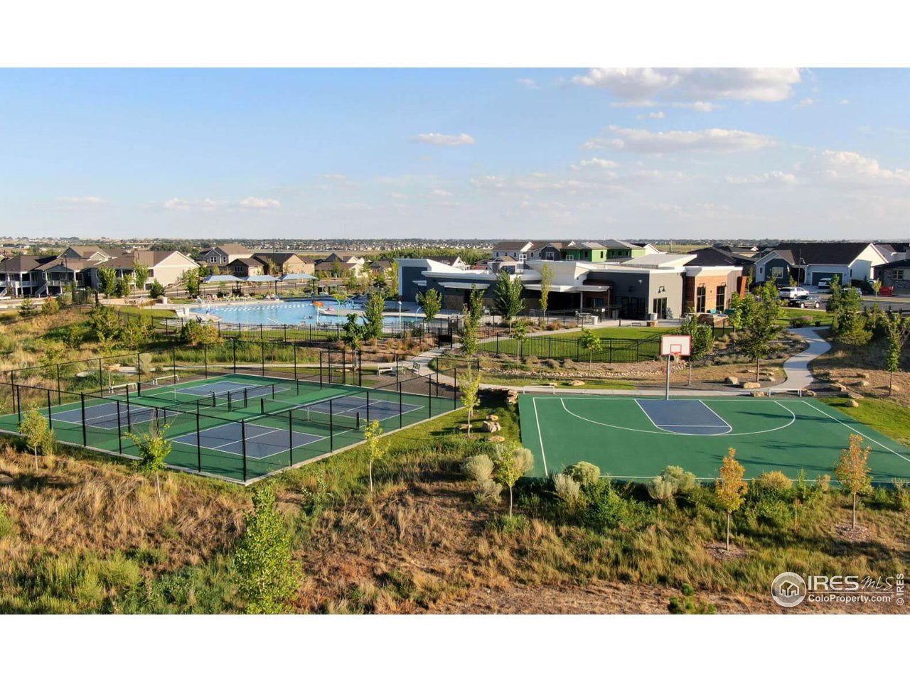 12889 Clearview Street Firestone, CO 80504 - Photo 30 of 38 a view of a lake with a city