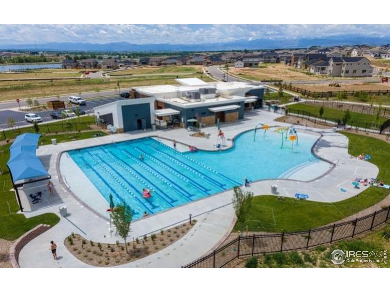 12889 Clearview Street Firestone, CO 80504 - Photo 33 of 38 a view of a swimming pool with a lounge chairs