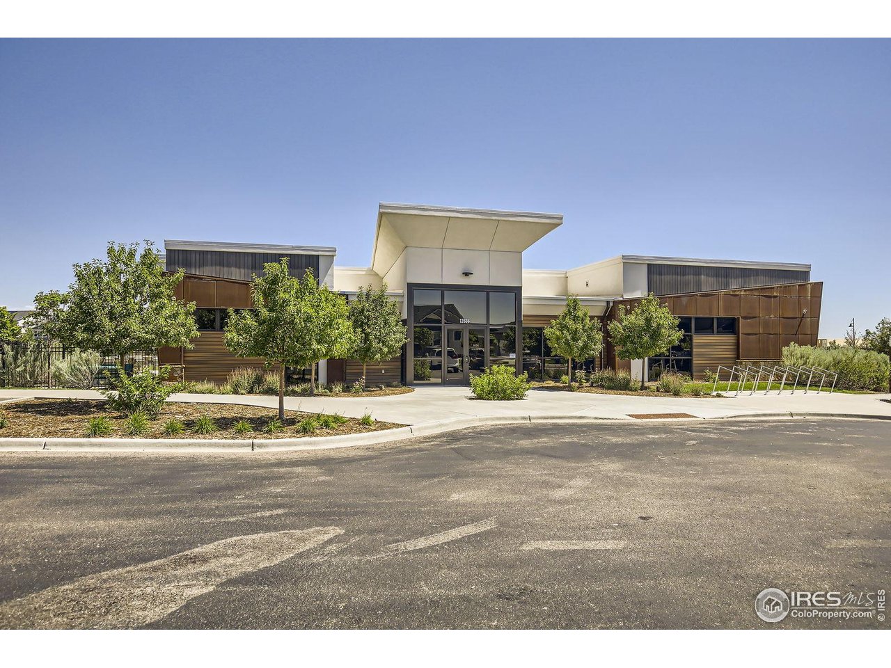 12889 Clearview Street Firestone, CO 80504 - Photo 36 of 38 a front view of a house with a yard and garage