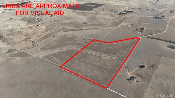 a white and red red sign sitting on a road