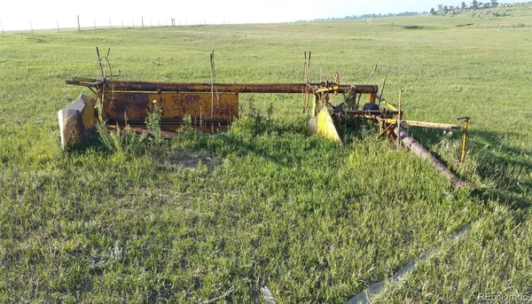 a view of a lake with a yard