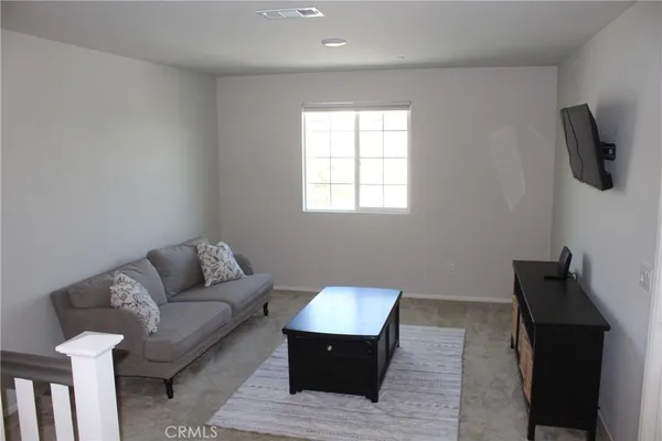 a bathroom with a sink and a window