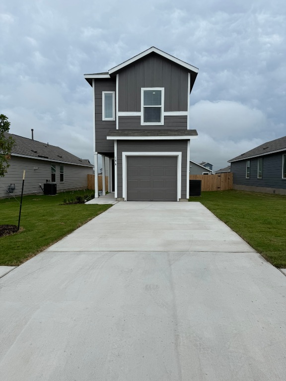 a front view of a house with yard