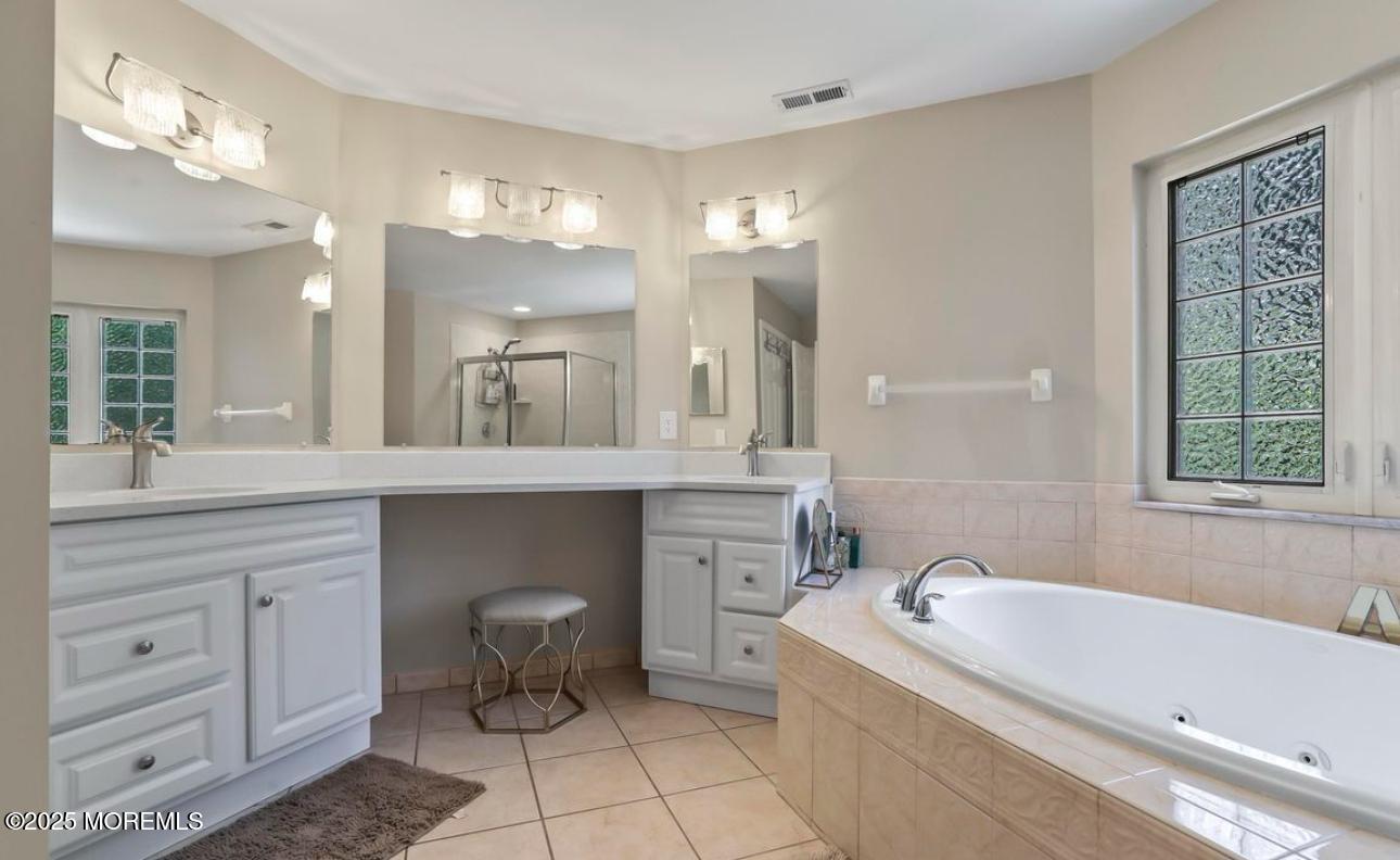 7 Round Hill Road Jackson, NJ 08527 - Photo 25 of 55 a bathroom with a granite countertop sink mirror bathtub and toilet