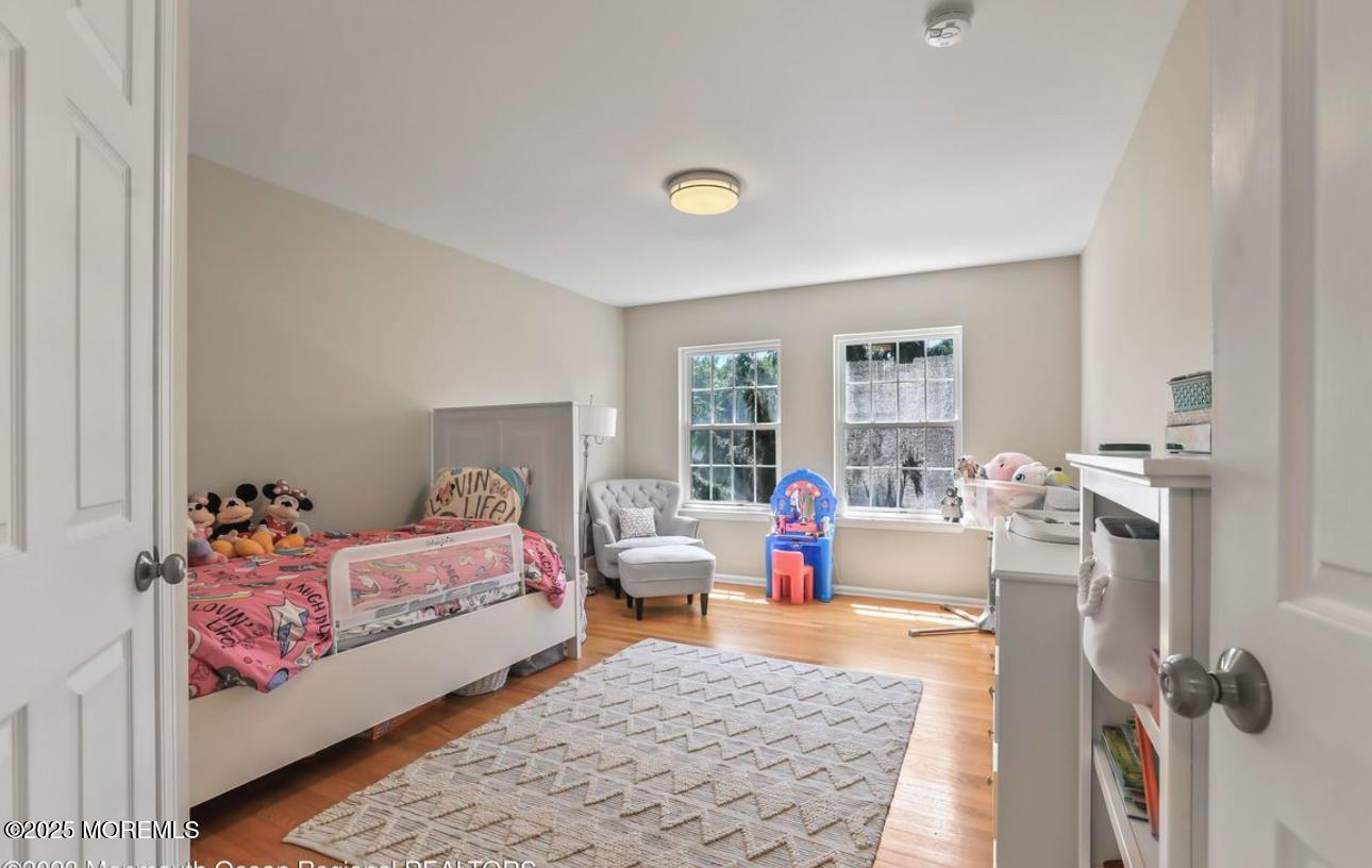 7 Round Hill Road Jackson, NJ 08527 - Photo 26 of 55 a living room with furniture and a table