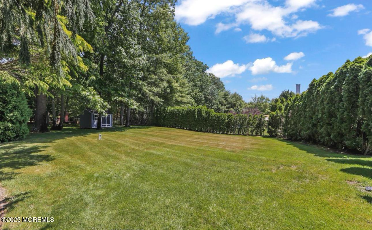 7 Round Hill Road Jackson, NJ 08527 - Photo 43 of 55 a view of yard with swimming pool and green space