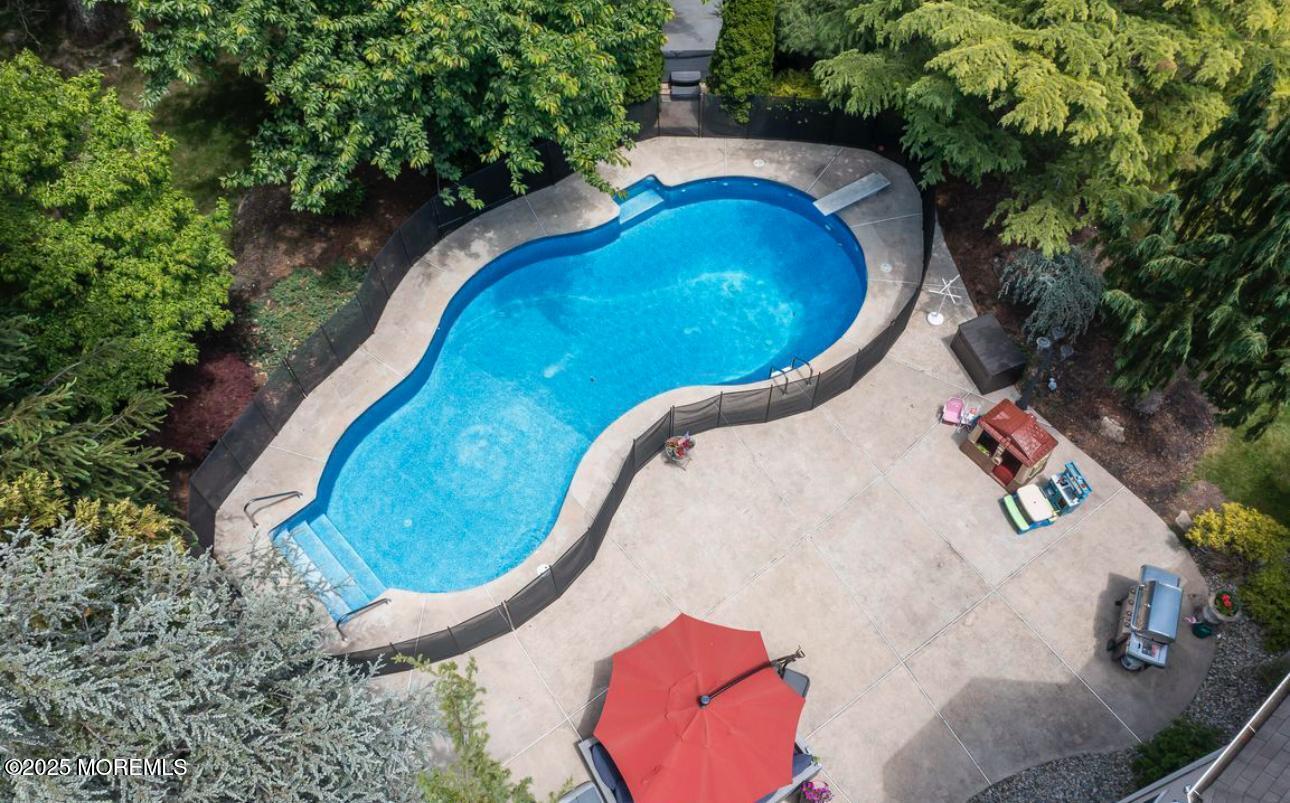 7 Round Hill Road Jackson, NJ 08527 - Photo 47 of 55 a view of outdoor space and swimming pool