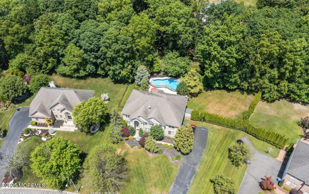 7 Round Hill Road Jackson, NJ 08527 - Photo 50 of 55 an aerial view of a house with a yard and lake view