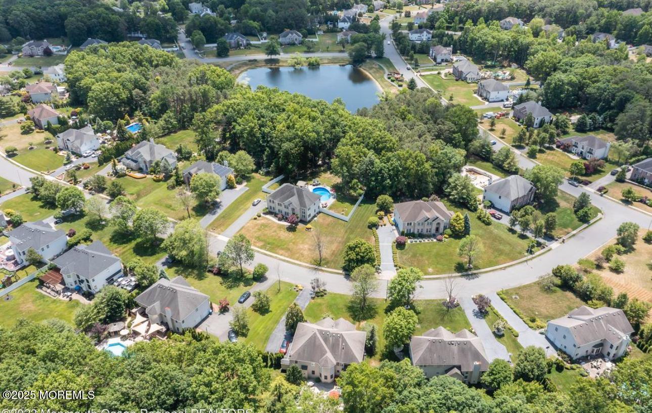 7 Round Hill Road Jackson, NJ 08527 - Photo 54 of 55 an aerial view of residential house with outdoor space and swimming pool