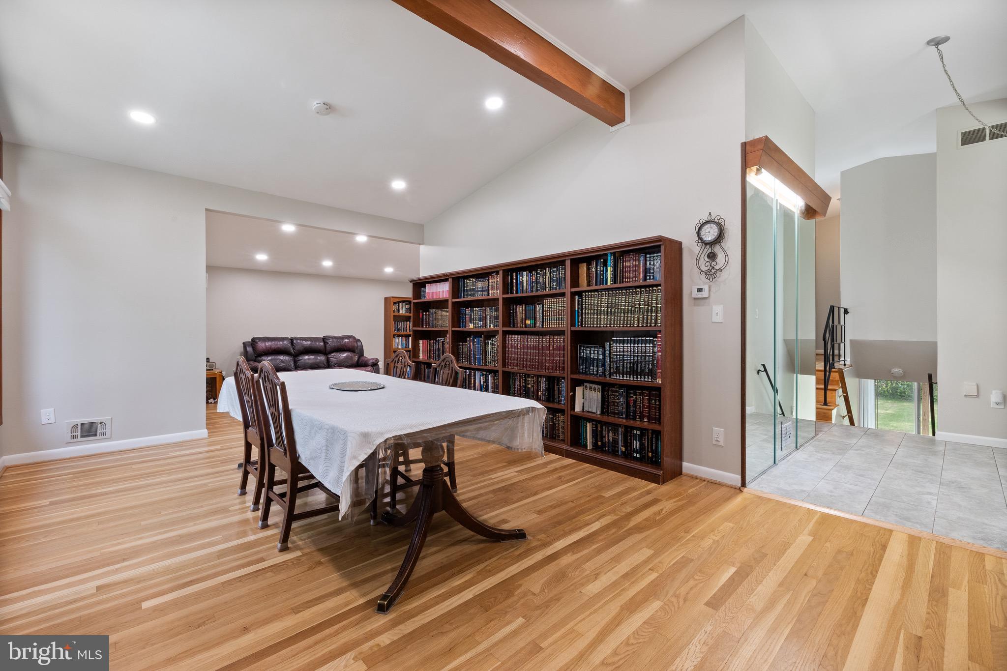 916 Hyde Road Silver Spring, MD 20902 - Photo 11 of 27 a view of a room with furniture and wooden floor