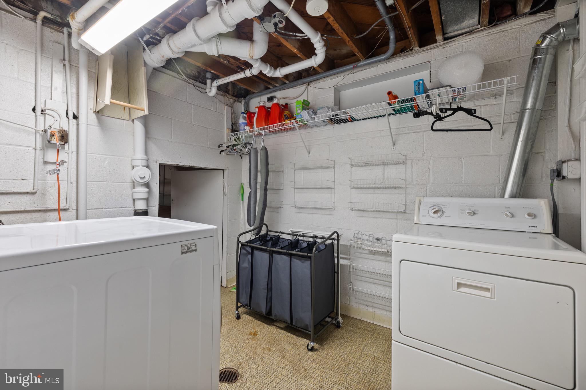 916 Hyde Road Silver Spring, MD 20902 - Photo 26 of 27 a utility room with dryer and washer