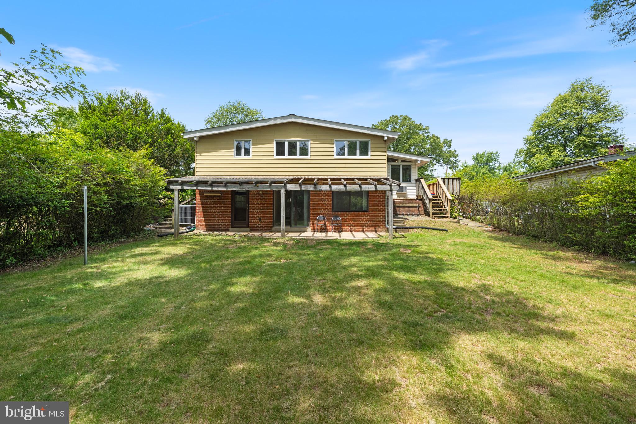 916 Hyde Road Silver Spring, MD 20902 - Photo 27 of 27 a view of a house with a big yard