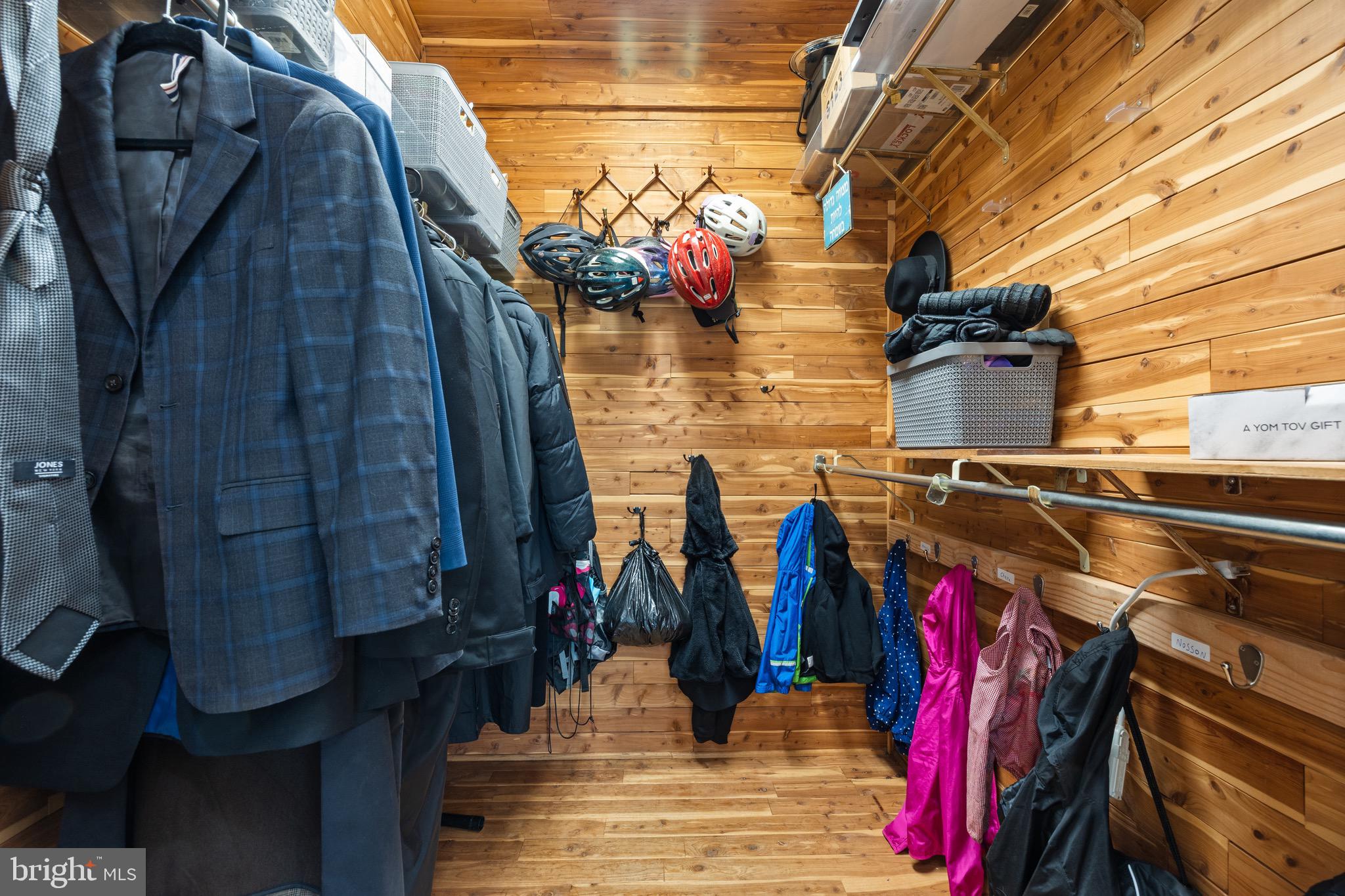 916 Hyde Road Silver Spring, MD 20902 - Photo 8 of 27 a view of walk in closet with clothes