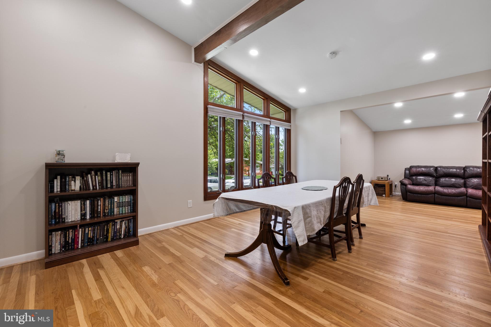916 Hyde Road Silver Spring, MD 20902 - Photo 10 of 27 a dining room with furniture and wooden floor