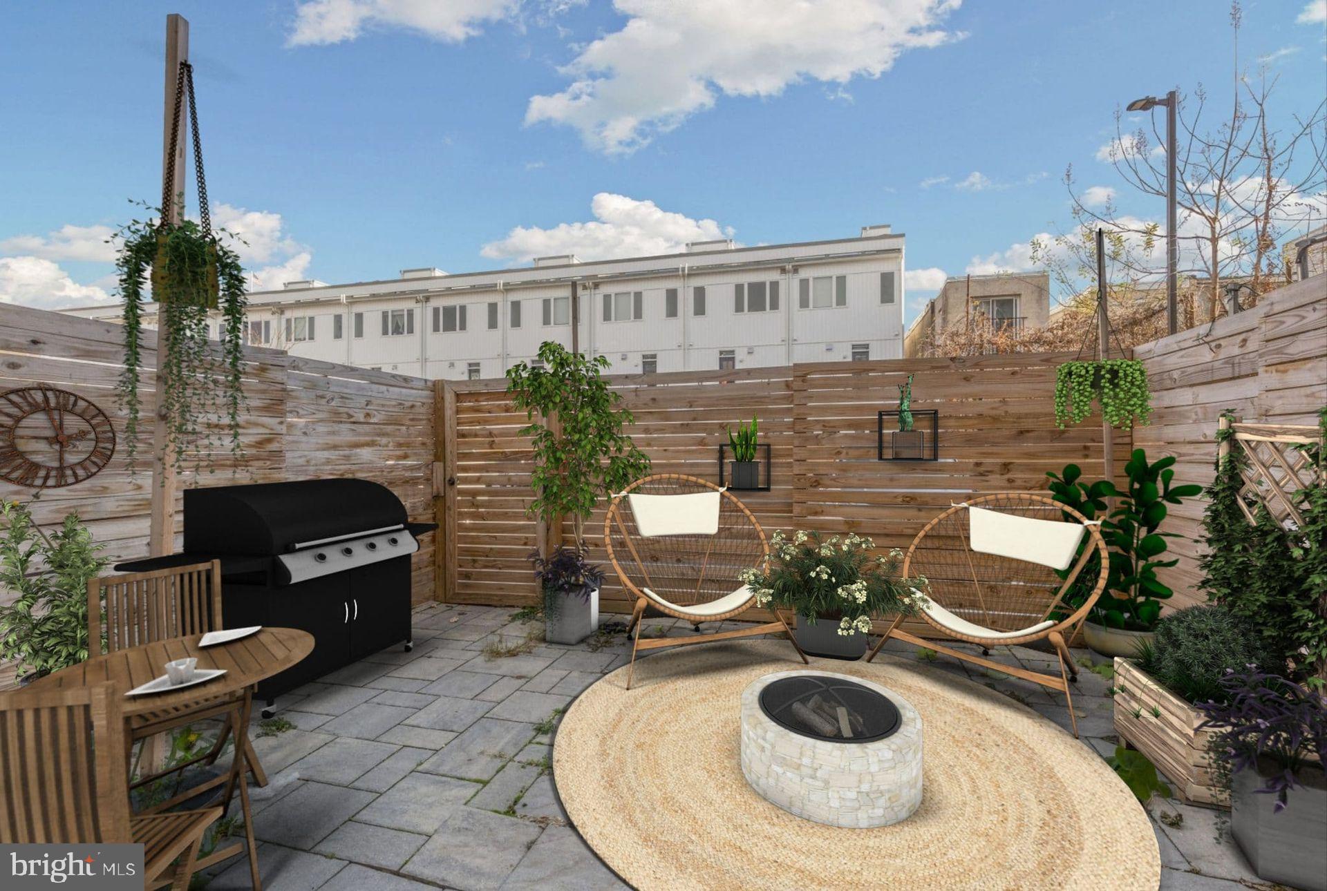 1240 LeCount Street, Unit A Philadelphia, PA 19121 - Photo 14 of 14 a balcony with table and chairs