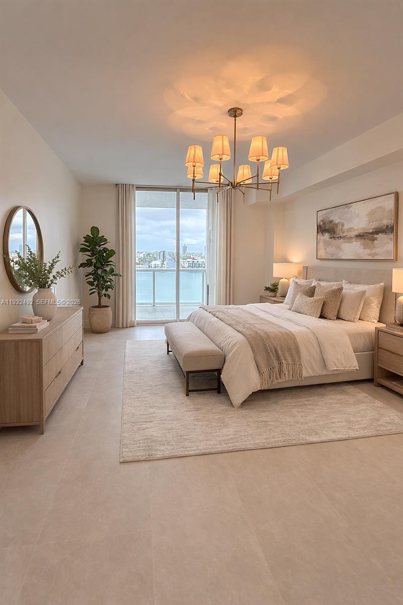 17050 North Bay Road, Unit 1102 Sunny Isles Beach, FL 33160 - Photo 5 of 10 a bedroom with a large bed and a large window