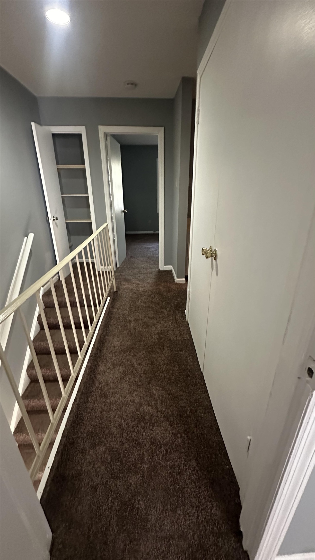 3811 South Mendenhall Road, Unit 3811 Memphis, TN 38115 - Photo 6 of 18 Corridor featuring carpet floors and baseboards