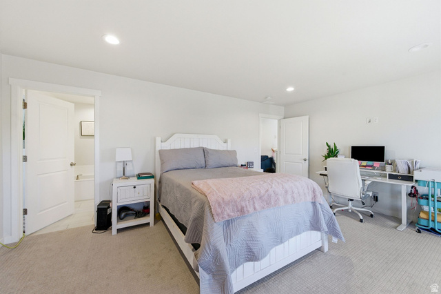 1038 South Old Towne Road Layton, UT 84041 - Photo 15 of 39 Spacious bedroom featuring neutral wall paint, recessed lighting, and soft carpet flooring