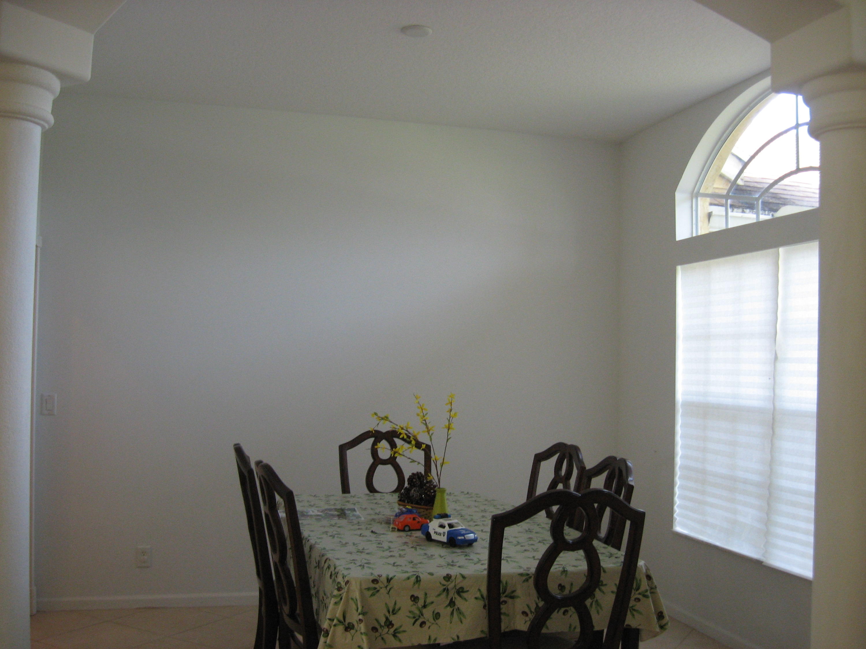 504 Southwest Undallo Road Port St. Lucie, FL 34953 - Photo 2 of 23 a view of a dining room with furniture and window