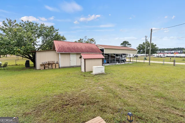 a roof deck with a table and chairs
