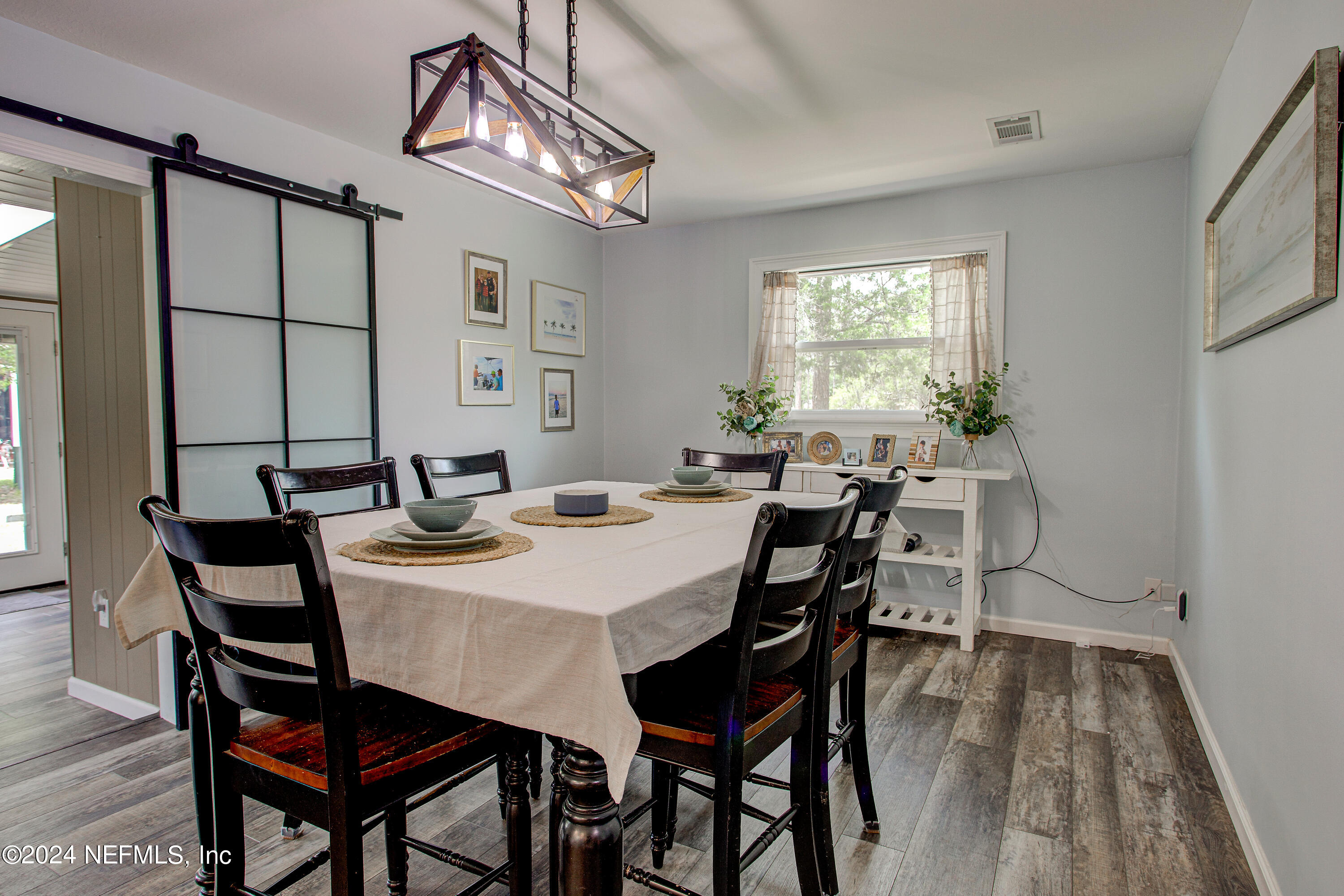 3963 Bronco Road Middleburg, FL 32068 - Photo 23 of 43 a view of a dining room with furniture and window