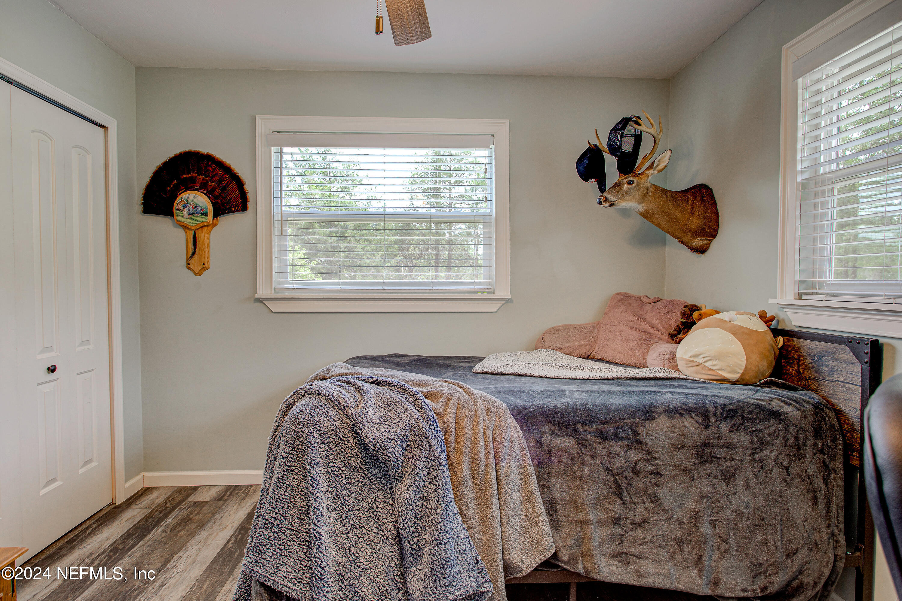 3963 Bronco Road Middleburg, FL 32068 - Photo 24 of 43 a bedroom with a bed and a window