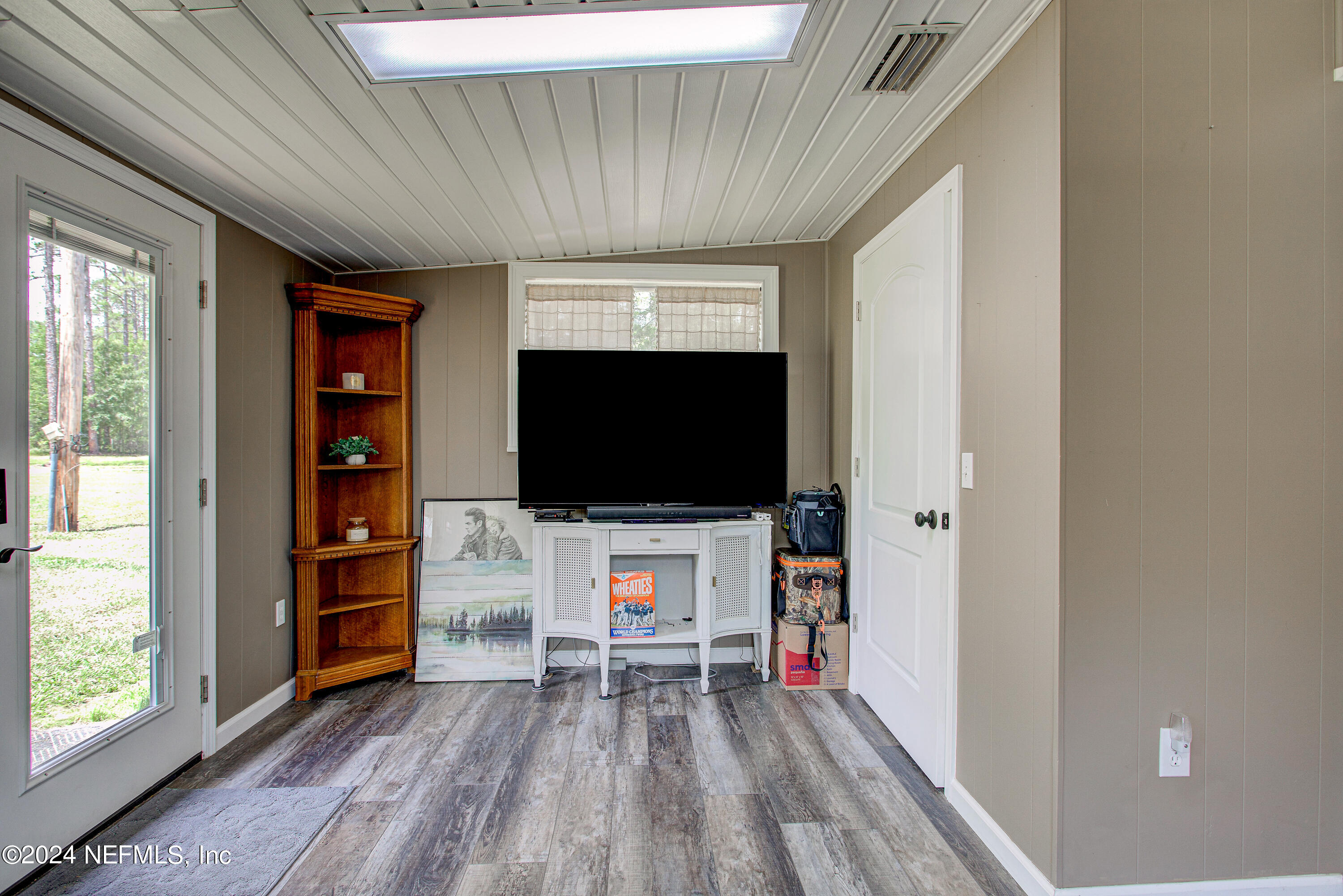3963 Bronco Road Middleburg, FL 32068 - Photo 34 of 43 a view of a livingroom with furniture and an empty room