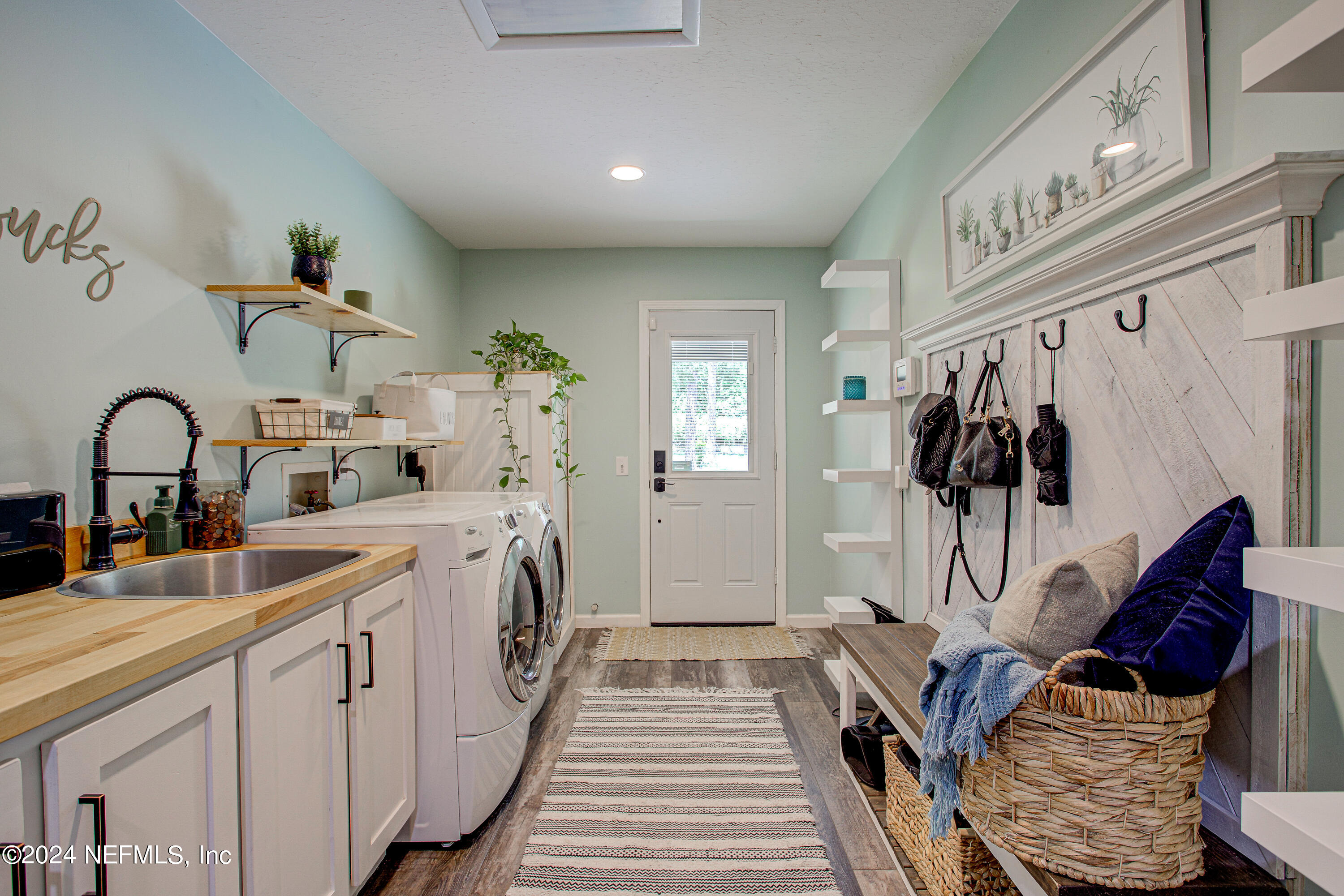 3963 Bronco Road Middleburg, FL 32068 - Photo 35 of 43 a spacious bathroom with a double vanity sink and a mirror