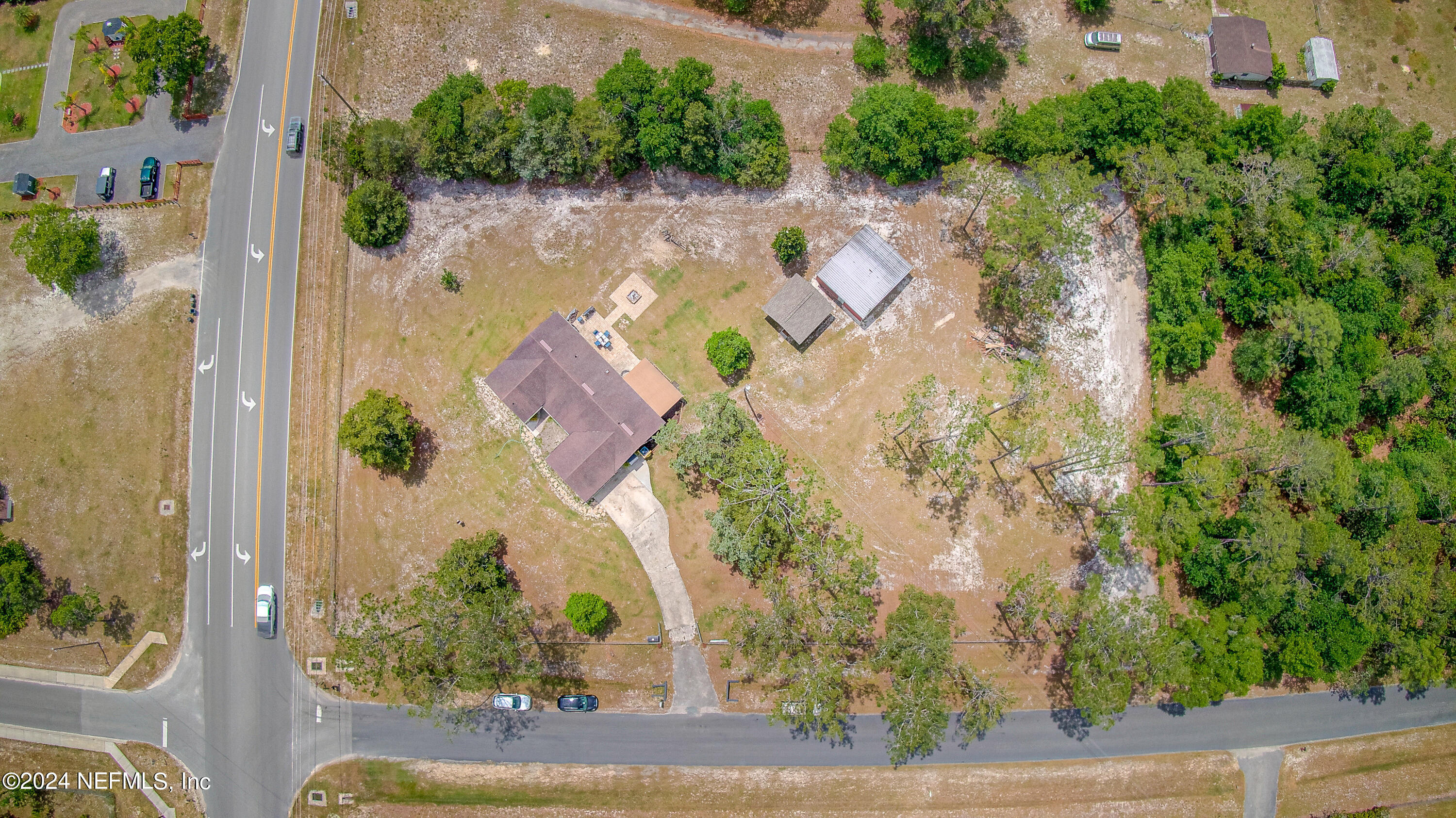 3963 Bronco Road Middleburg, FL 32068 - Photo 4 of 43 an aerial view of a house with yard