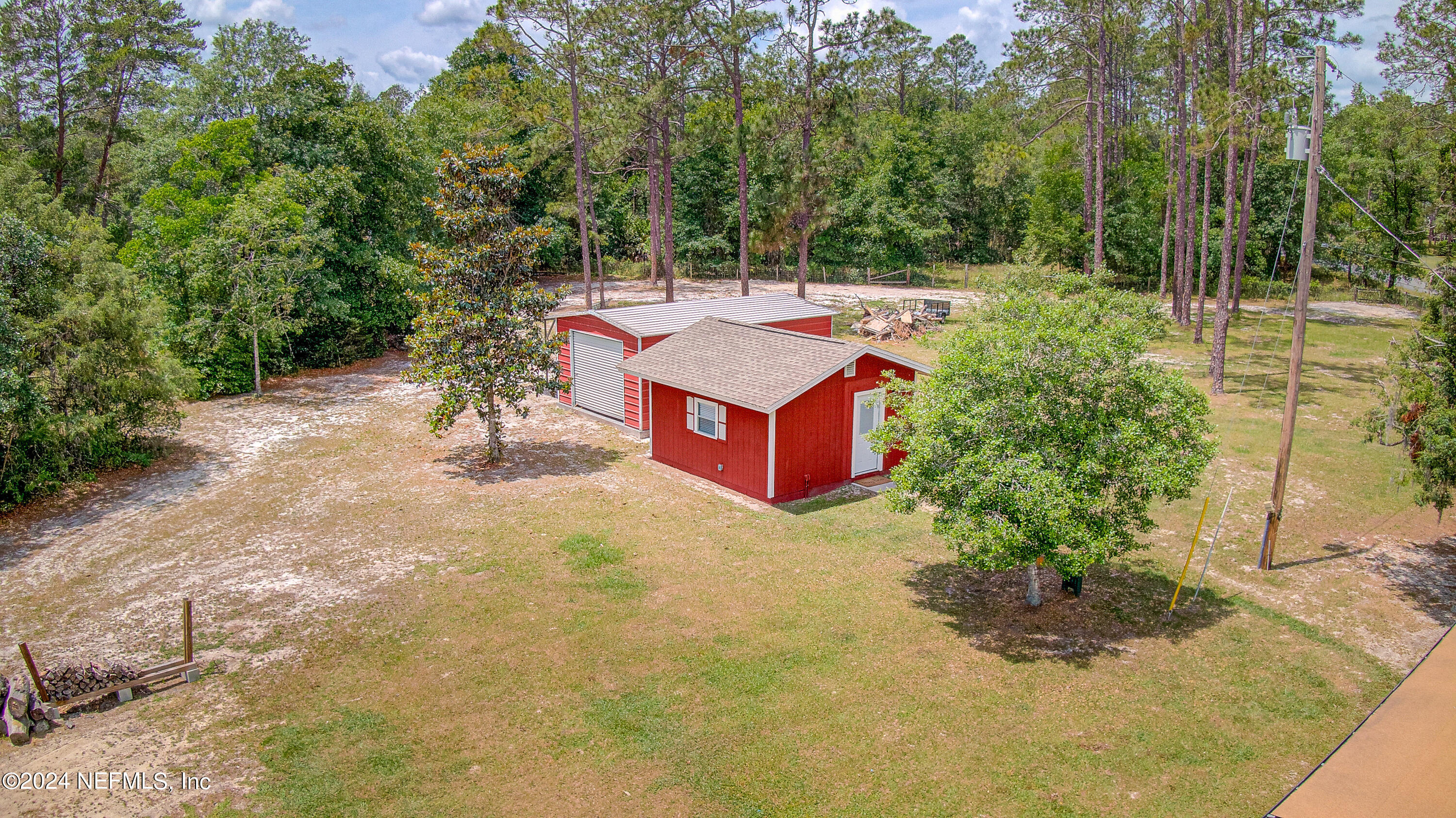 3963 Bronco Road Middleburg, FL 32068 - Photo 5 of 43 a view of a mini pool with two chairs and a yard