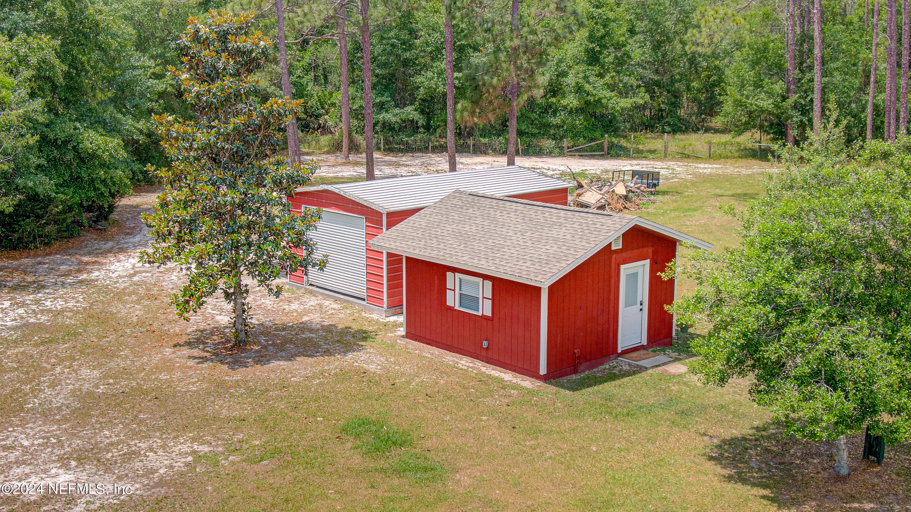 3963 Bronco Road Middleburg, FL 32068 - Photo 6 of 43 a view of a barn with yard