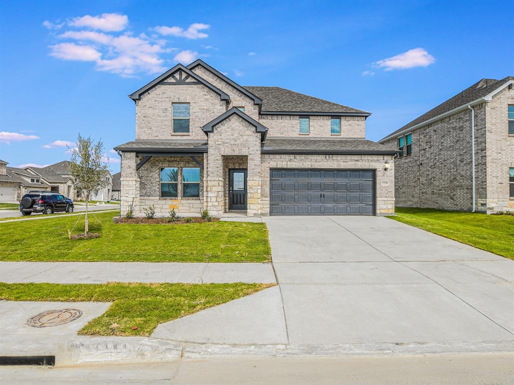 2328 Volans Drive Haslet, TX 76052 - Photo 1 of 1 a front view of a house with a yard