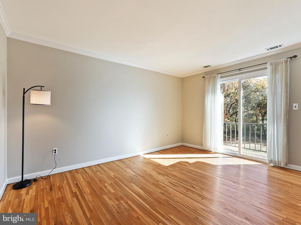 2101 Silver Court Hamilton, NJ 08690 - Photo 12 of 27 Spacious living room with sliding door to balcony