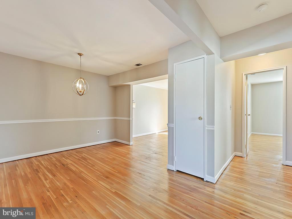 2101 Silver Court Hamilton, NJ 08690 - Photo 3 of 27 View of living room, dining room and hallway