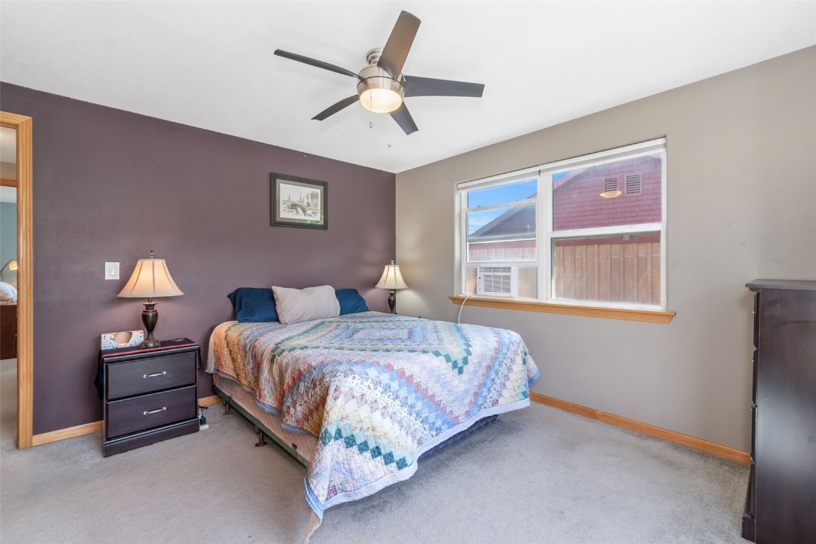 2981 Abbey Road Steamboat Springs, CO 80487 - Photo 20 of 27 a spacious bedroom with a bed and a window