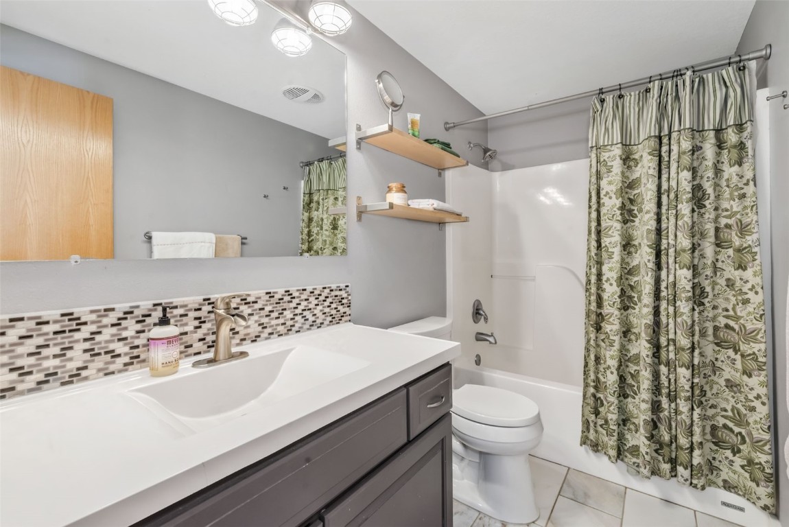 2981 Abbey Road Steamboat Springs, CO 80487 - Photo 22 of 27 a bathroom with a sink a toilet and shower