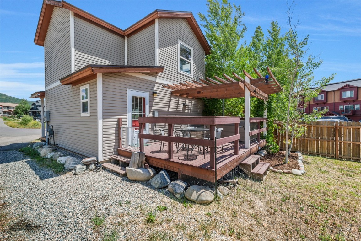 2981 Abbey Road Steamboat Springs, CO 80487 - Photo 5 of 27 a wooden bench sitting in front of a house